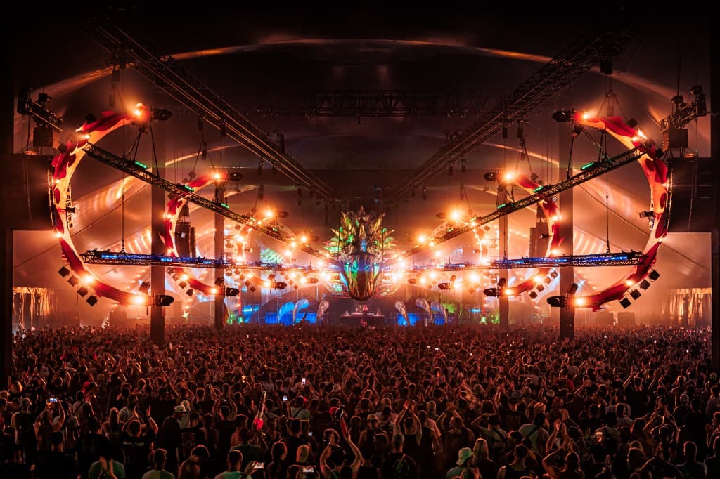 Large festival crowd and stage production representing music-industry and live-event clients we support.